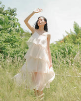 Layered organza dress with flowing tiers and delicate straps for ethereal summer elegance